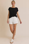 SOLID WOVEN TEE WITH FRONT KNOT DETAIL