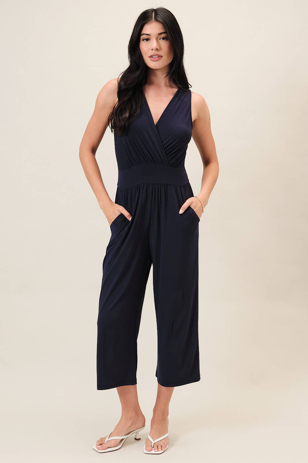 SURPLICE SLEEVELESS WAIST DEFINED CROPPED JUMPSUIT