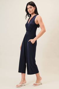 SURPLICE SLEEVELESS WAIST DEFINED CROPPED JUMPSUIT