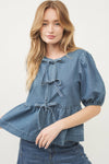 DENIM FRONT BOW TIE PEPLUM BLOUSE