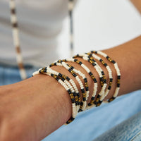 Sage Beaded 10 Strand Stretch Bracelets Gold, Black, + Ivory